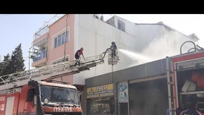 Yangına müdahale yan binadan